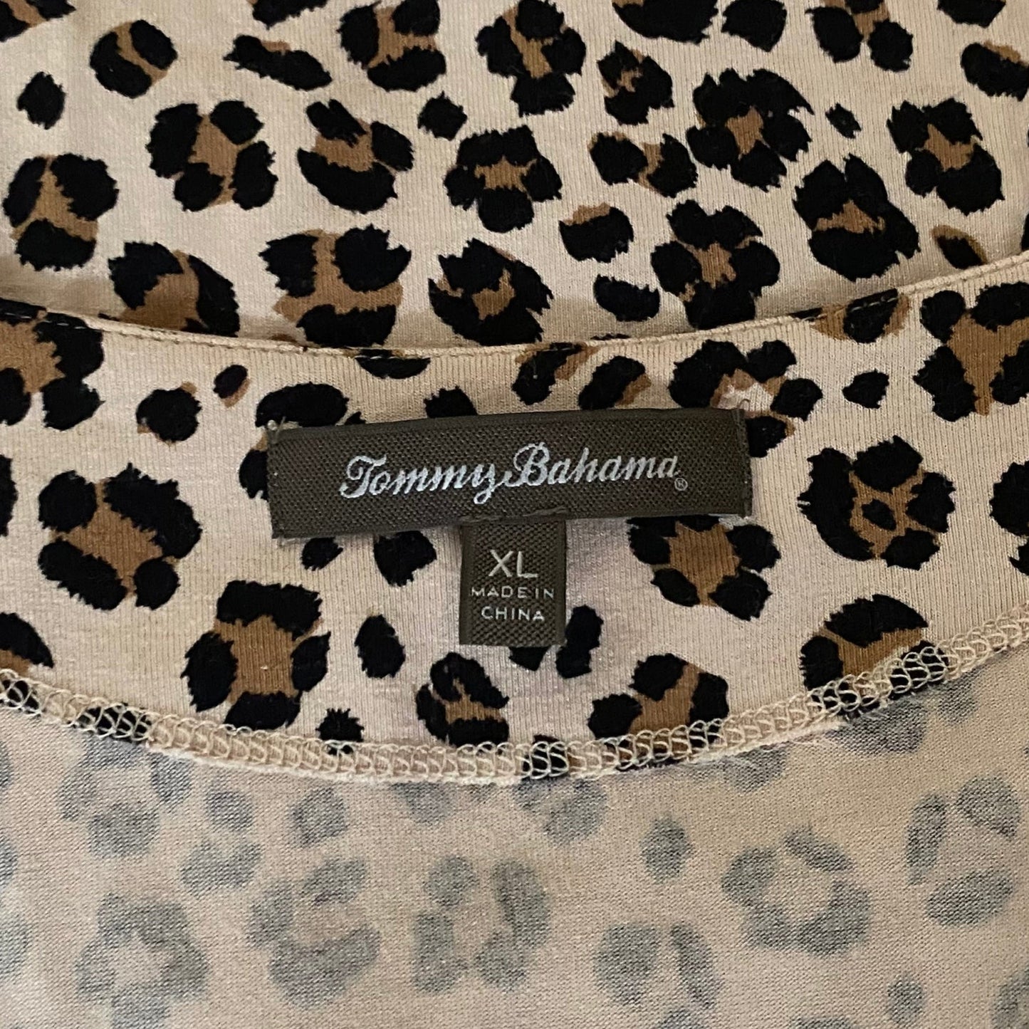 Product tag and label for the Tommy Bahama leopard print faux wrap dress in midsize XL