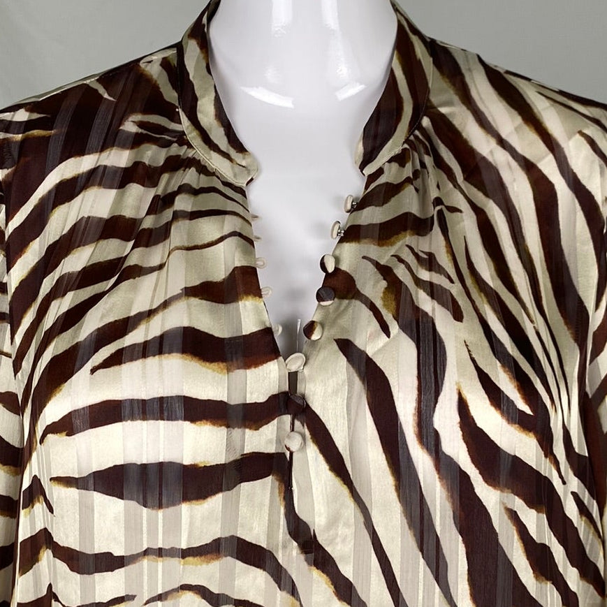 Close up of Melanie Lyne Animal Print Blouse neck details in Plus Size 20