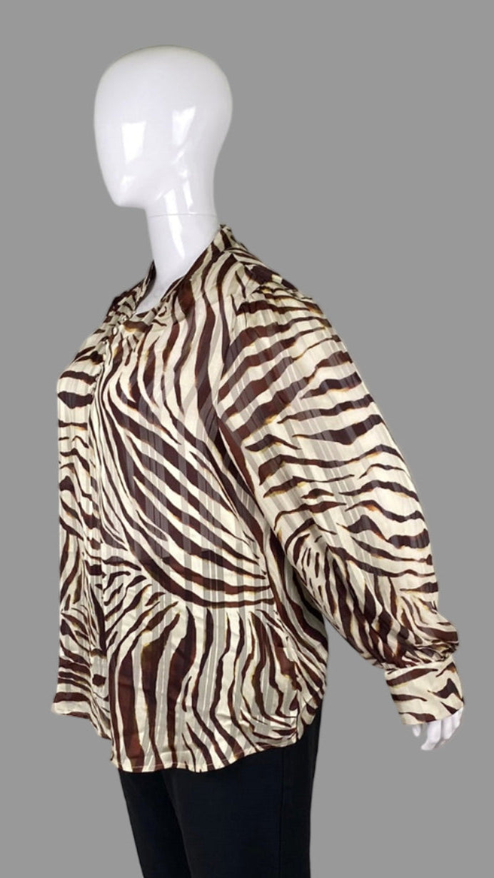 Side view of Melanie Lyne Animal Print Blouse in Plus Size 20