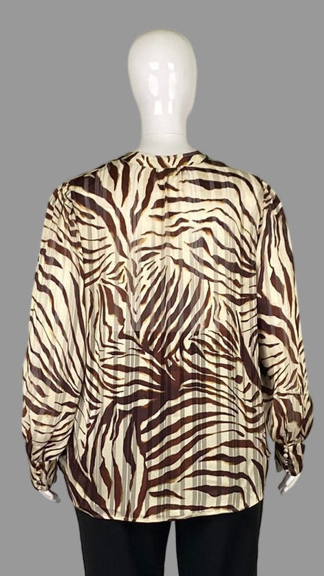 Back view of Melanie Lyne Animal Print Blouse in Plus Size 20