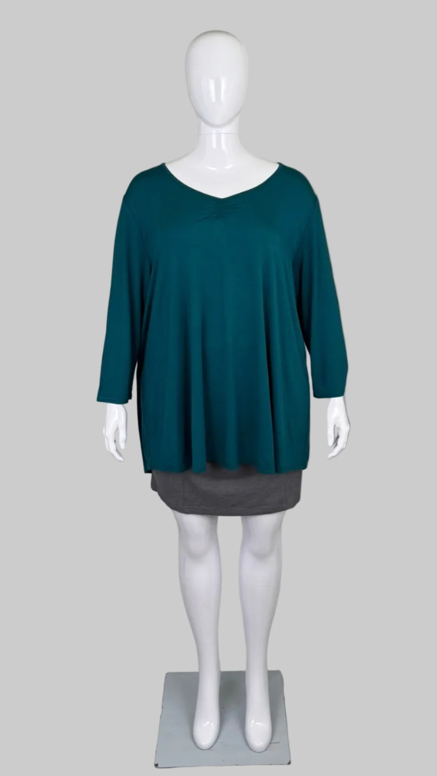 Front view of Blue Sky Teal Green Bamboo Tunic Top in Size 2X styled with a skirt