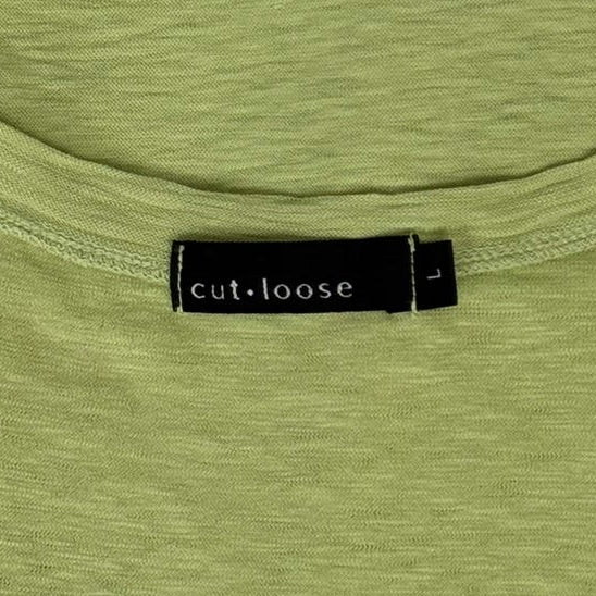 Label of a size Large vibrant green short sleeve tunic from cut loose.
