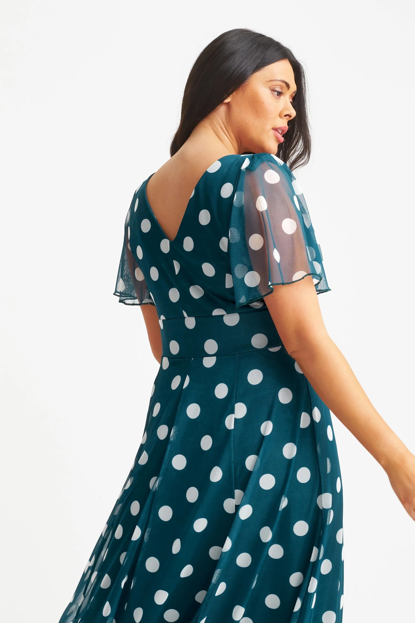 Back view of a real model wearing Scarlett & Jo Teal Lollidot Victoria Dress  in Plus Size 22