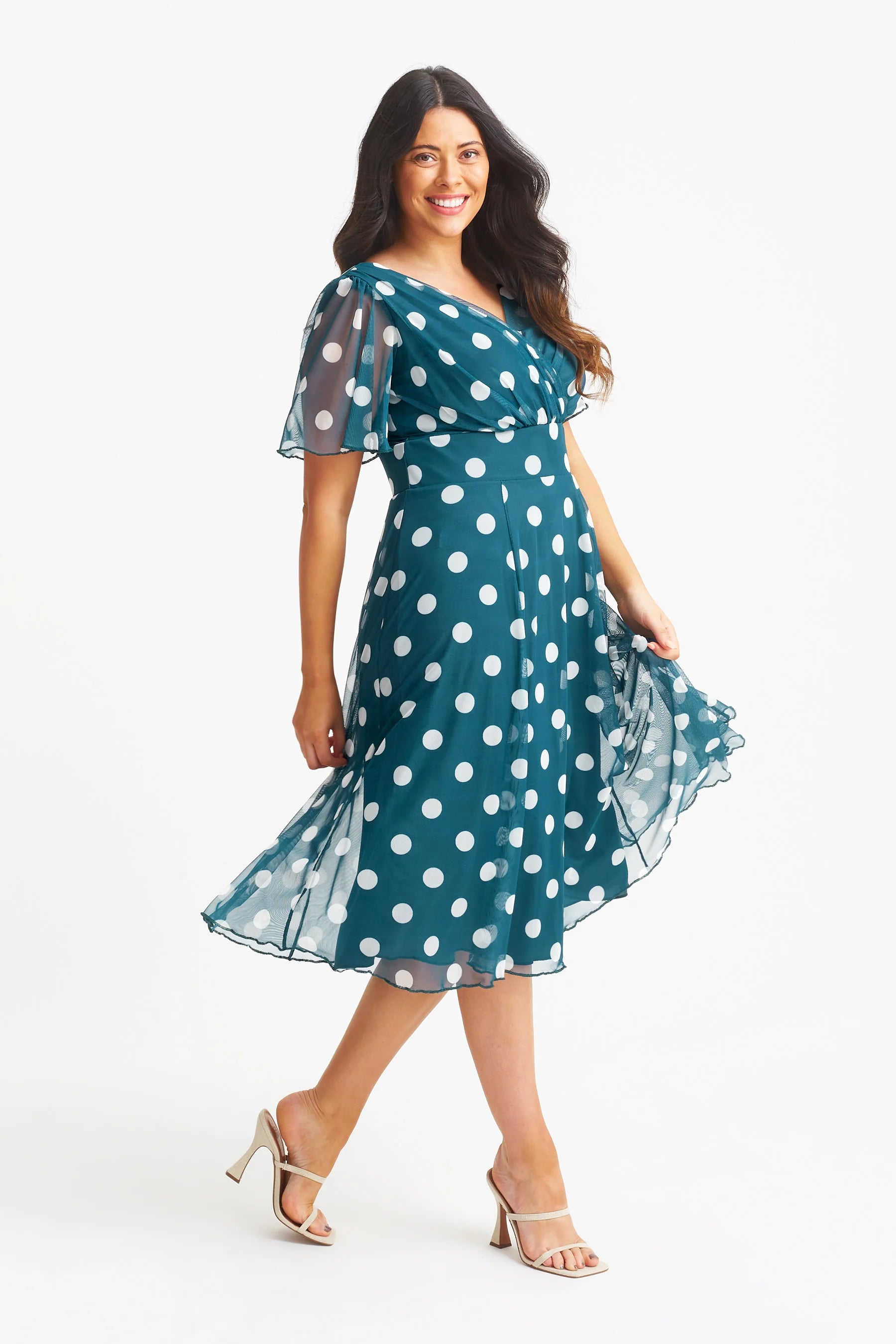 A real model wearing Scarlett & Jo Teal Lollidot Victoria Dress  in Plus Size 22